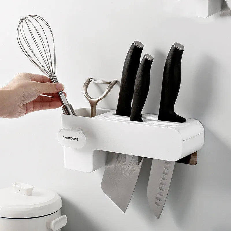 White plastic kitchen knife rack with modern simple design on a countertop