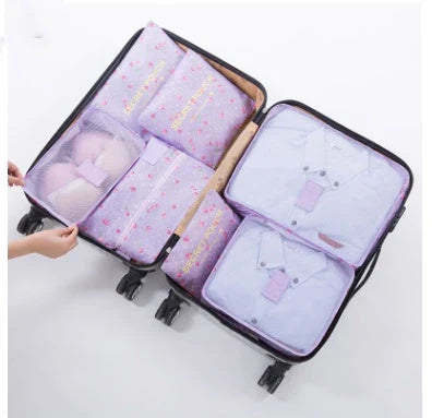 Premium waterproof travel packing cubes in various colors for organized packing and storage