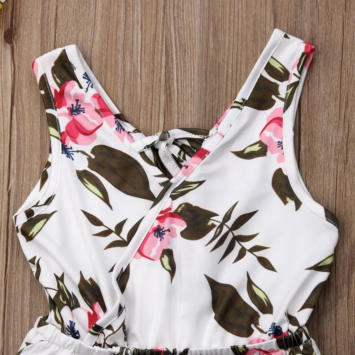 White and yellow floral print cotton summer outfit for a baby girl in Asian sizes 90cm to 130cm.