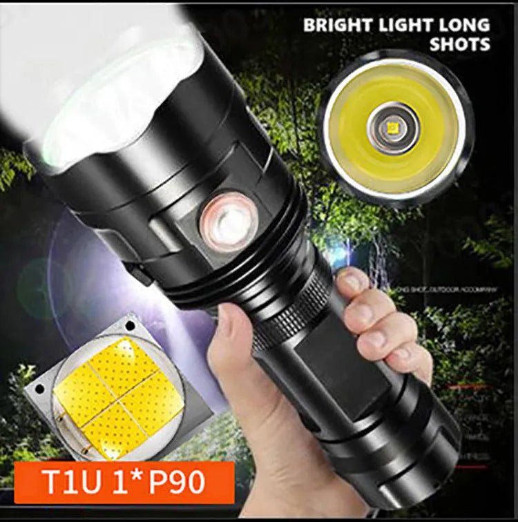 Black anodised aluminium LED flashlight with large head, showing tactical design and side switch