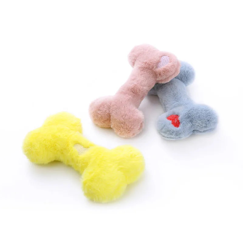 Blue bone-shaped plush dog toy with squeaker and grinding teeth texture for interactive play