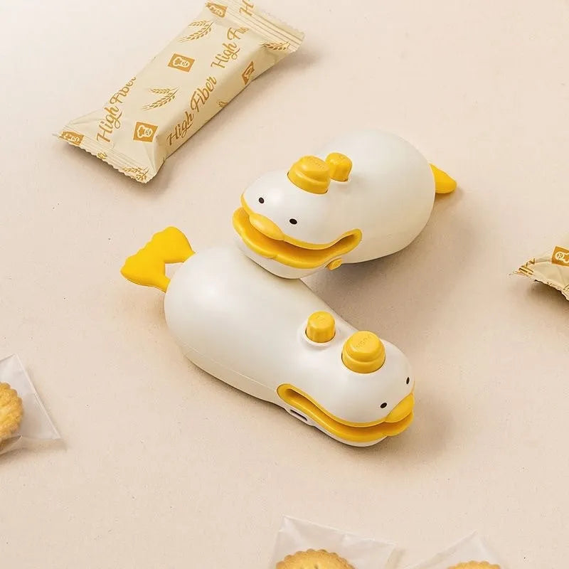 Small yellow duck-shaped rechargeable sealing machine with animal jacquard pattern