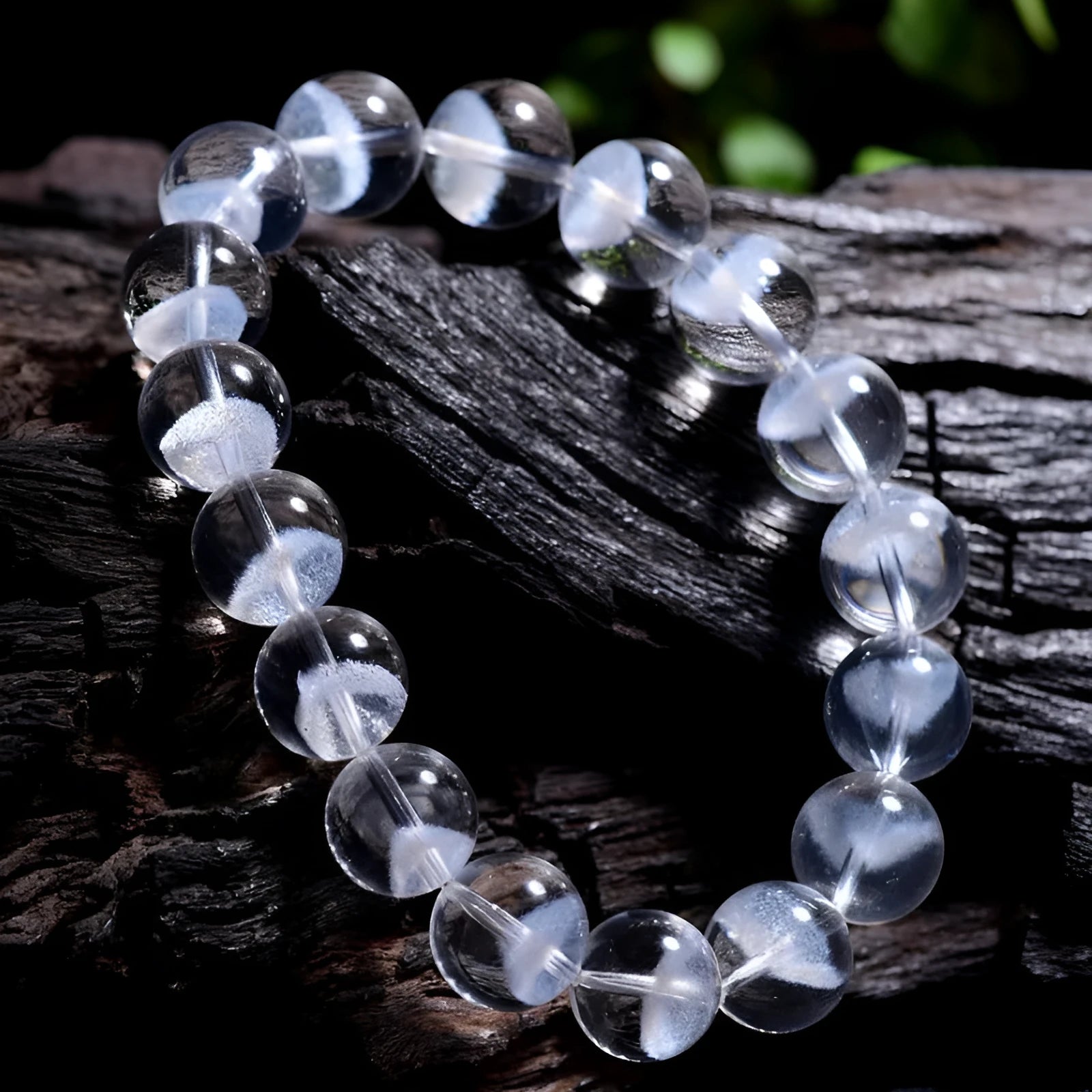 Women's natural white ghost bracelet with a white crystal pyramid charm and ruyi design elements.