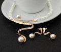 Gold electroplated pearl necklace and earrings set with drop-shaped pendant on deep V clavicle chain