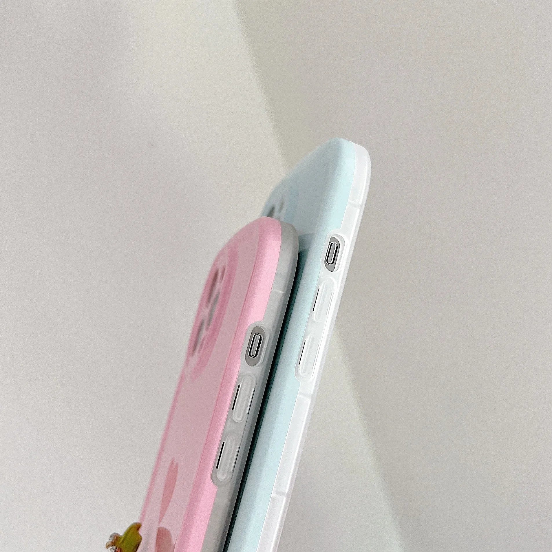 Cute macaron colour love phone case for iPhone in pink, purple, blue, and white options with TPU PC hard back cover