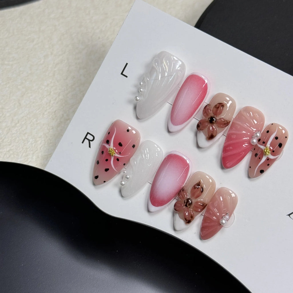 Hand-painted 3D nail art stickers with carved candy patterns in almond shapes