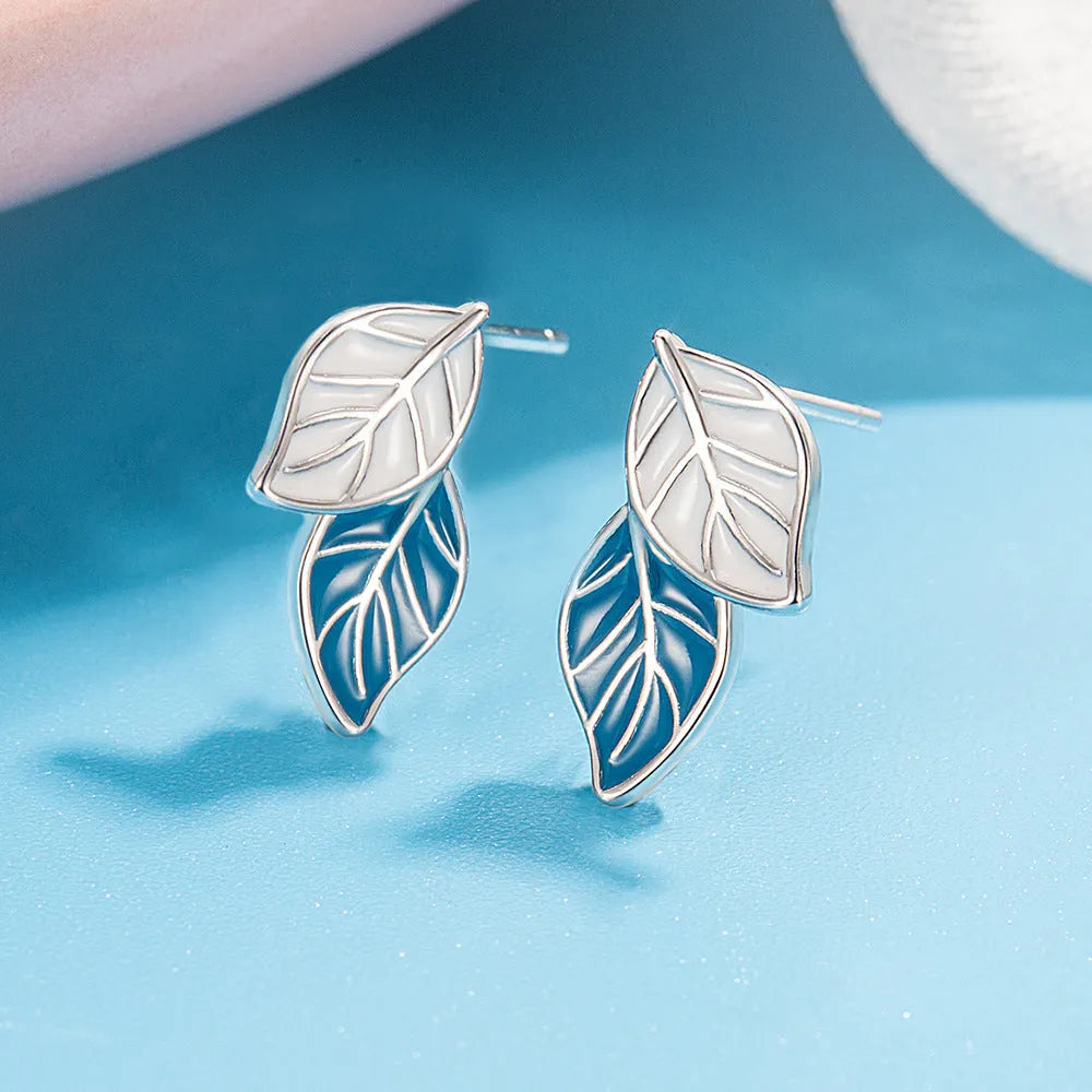 Leaf-shaped stud earrings for women in copper with white gold plating, geometric design, one pair