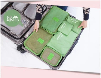 Premium waterproof travel packing cubes in various colors for organized packing and storage