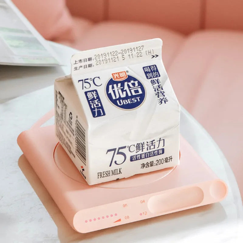 USB powered heating cup pad with mechanical touch controls in pink or white colour options