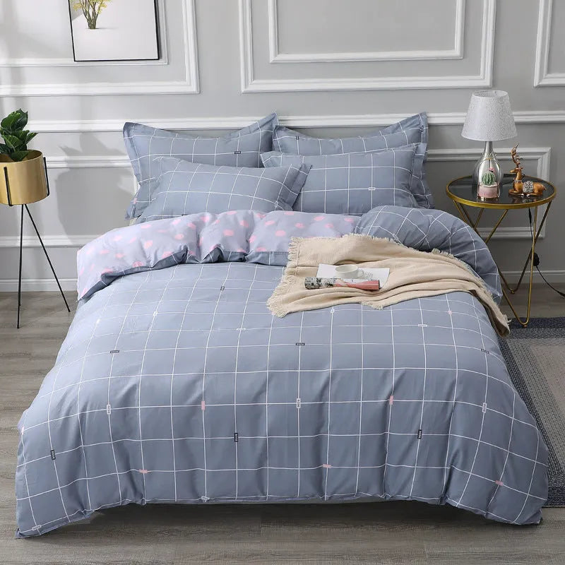Cotton four-piece bedding set in multiple sizes with quilt cover, fitted sheet, and pillowcases
