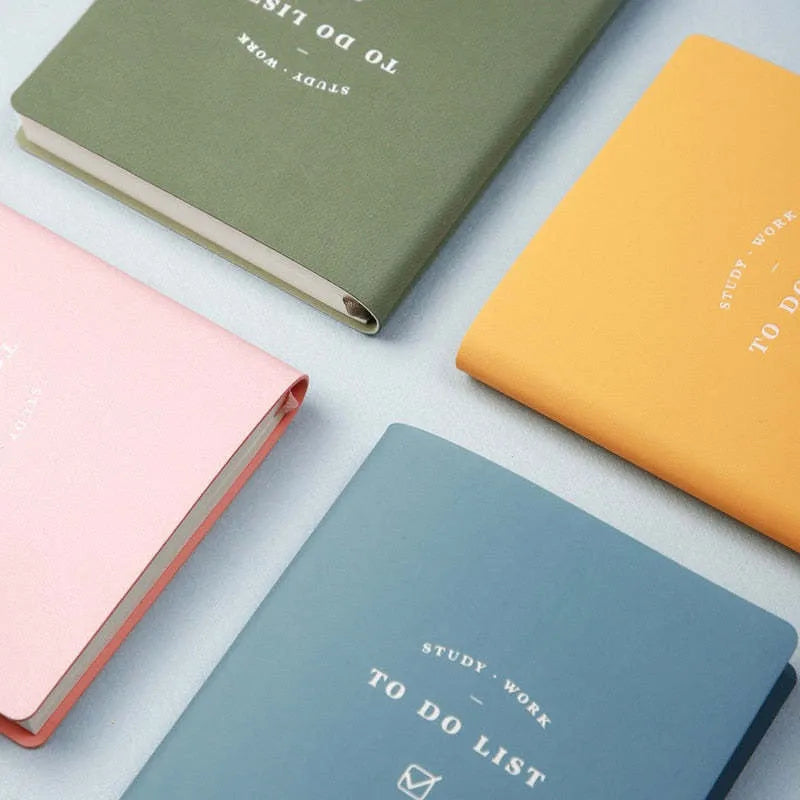 Simple style A6 portable todo list notebook with PU cover in macaron yellow, green, pink, or blue.