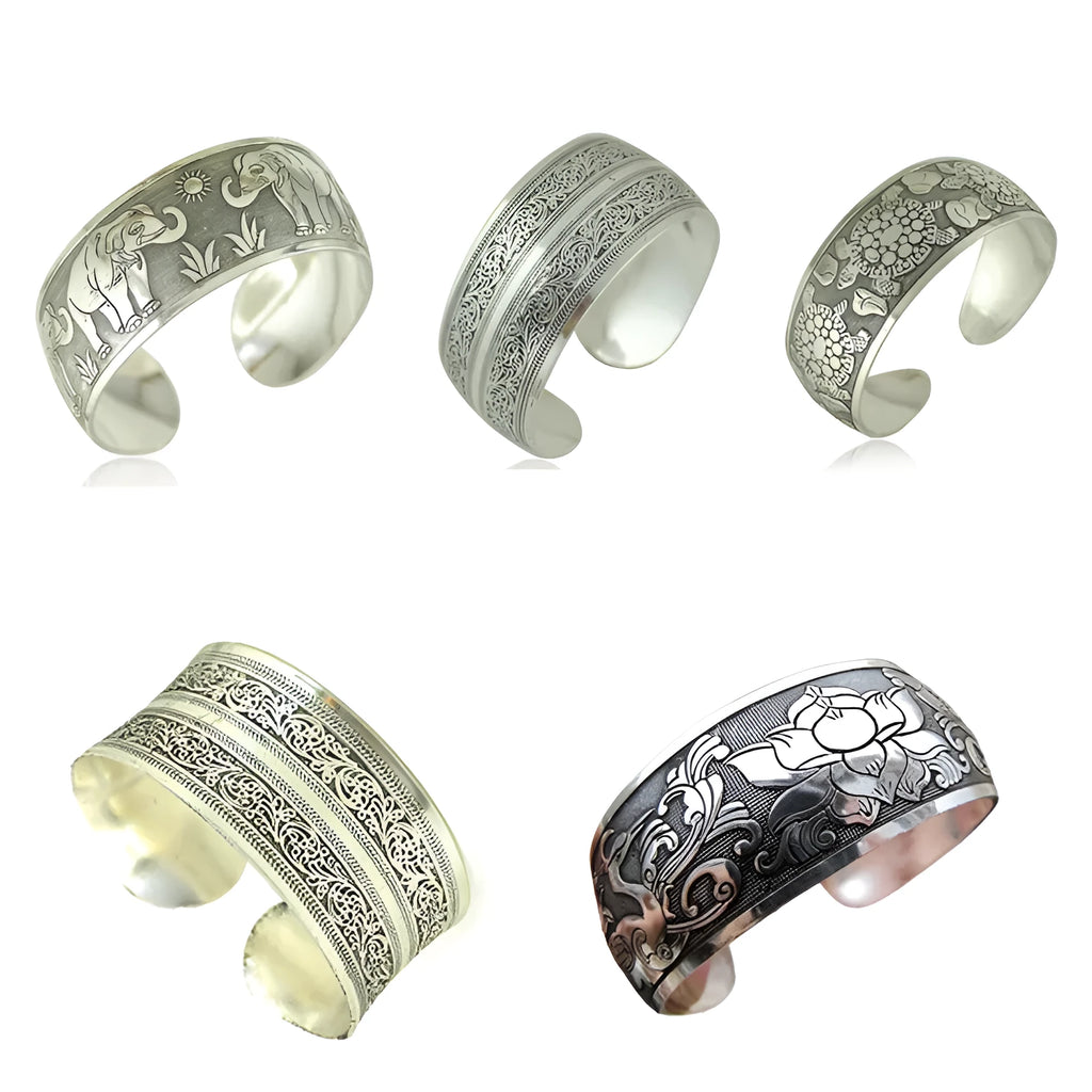 Miao-inspired ethnic bracelet with carved open design in elephant colour Roman shape