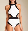 Women's one piece swimsuit in black and white patchwork design