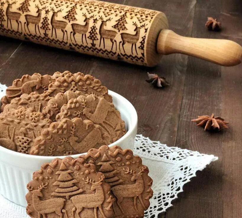 Personalized Christmas rolling pin with a variety of embossed holiday designs, including snowflakes, reindeer, and Merry Christmas patterns