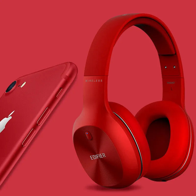 Black, red, and white Bluetooth sports headphones with over-ear design.