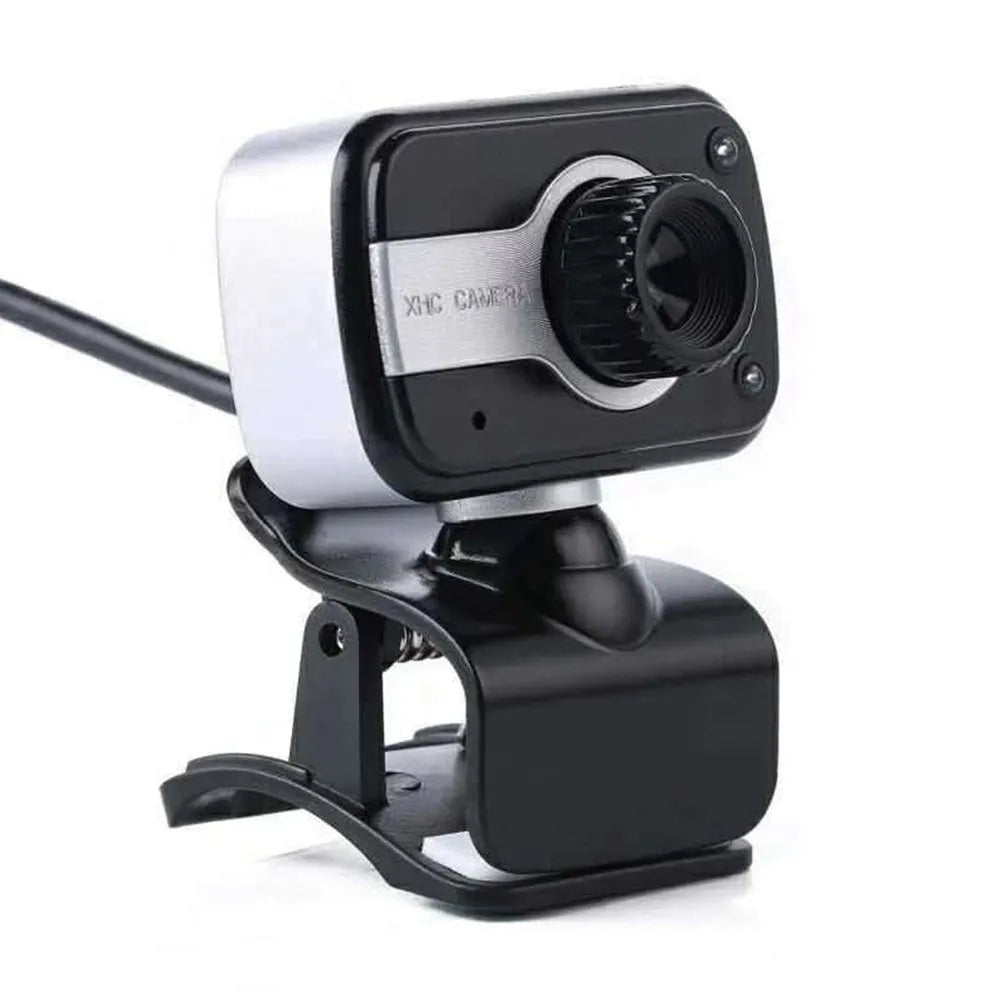 Blue mini USB webcam with rotating base on a laptop screen.