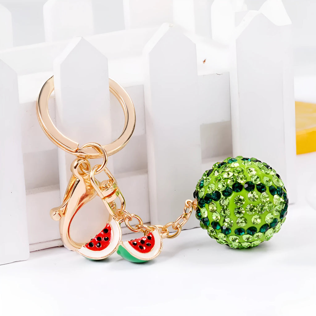 Green zinc alloy watermelon-shaped keychain measuring 12 cm.