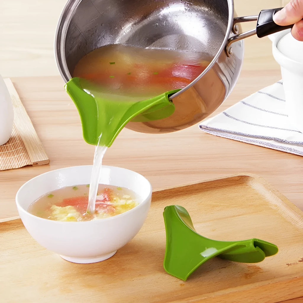 Green silicone clip-on kitchen funnel for pouring liquids into round pots.
