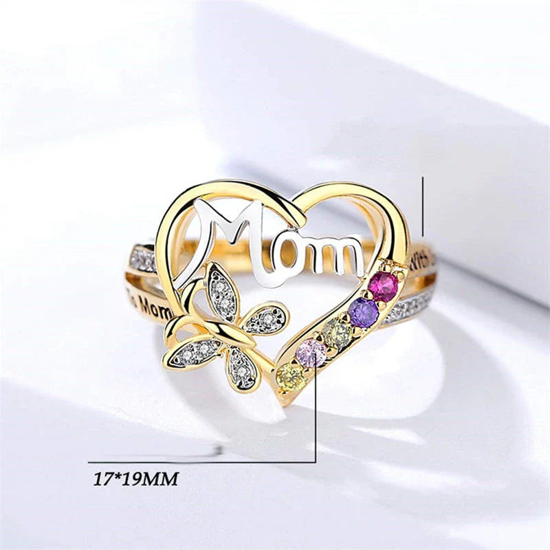 A sparkling heart-shaped ring with a captivating rhinestone butterfly motif, a thoughtful Mother's Day gift.