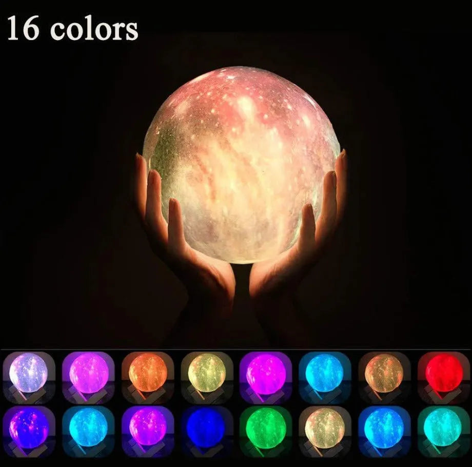 3D-printed spherical lunar night light with remote control on a dark surface.