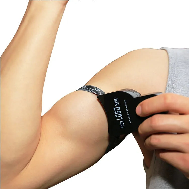 Black ABS plastic body fat caliper measuring skin fold thickness with a 0-70mm scale.