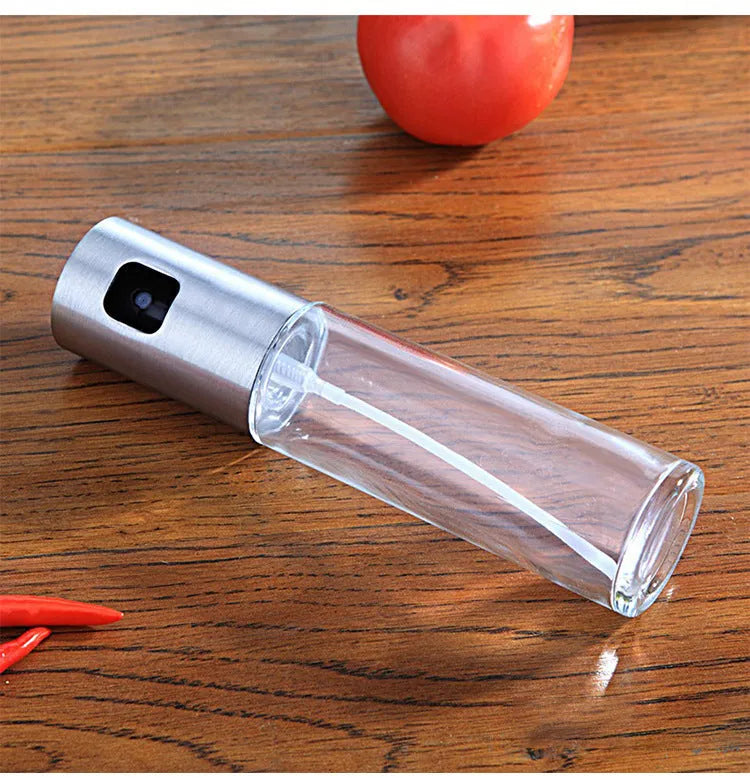 Gold push-type oil spray bottle with glass reservoir and ABS pump for BBQ and kitchen use