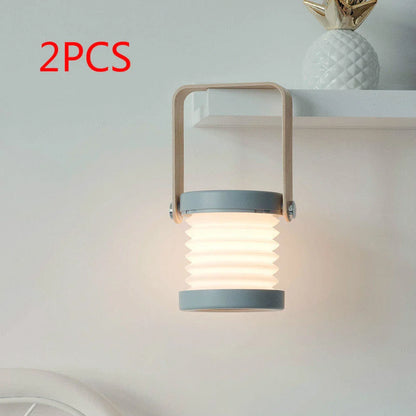 A foldable LED lamp with touch-sensitive dimming control, rechargeable battery, and a versatile design for home decor.