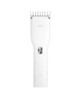 Black cordless hair clipper with a sliding length adjustment comb on a white background.