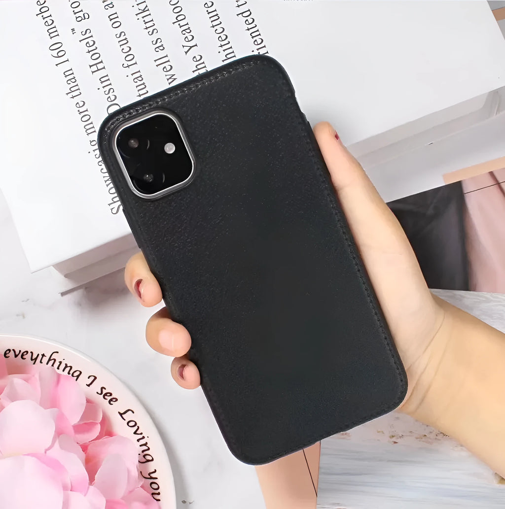 Leather and TPU iPhone case in black, shown on an iPhone.