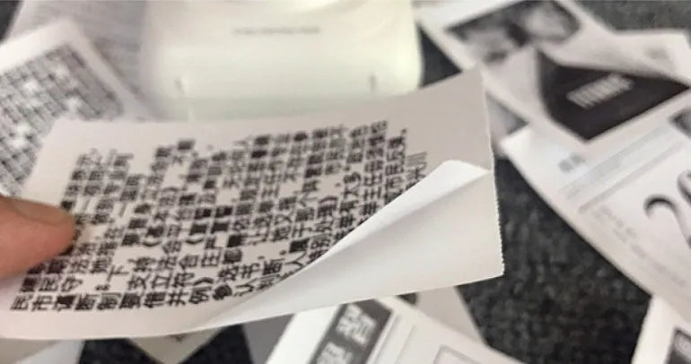 PerPage Mini wireless portable thermal printer paper rolls in regular, sticker and label styles, multiple colours