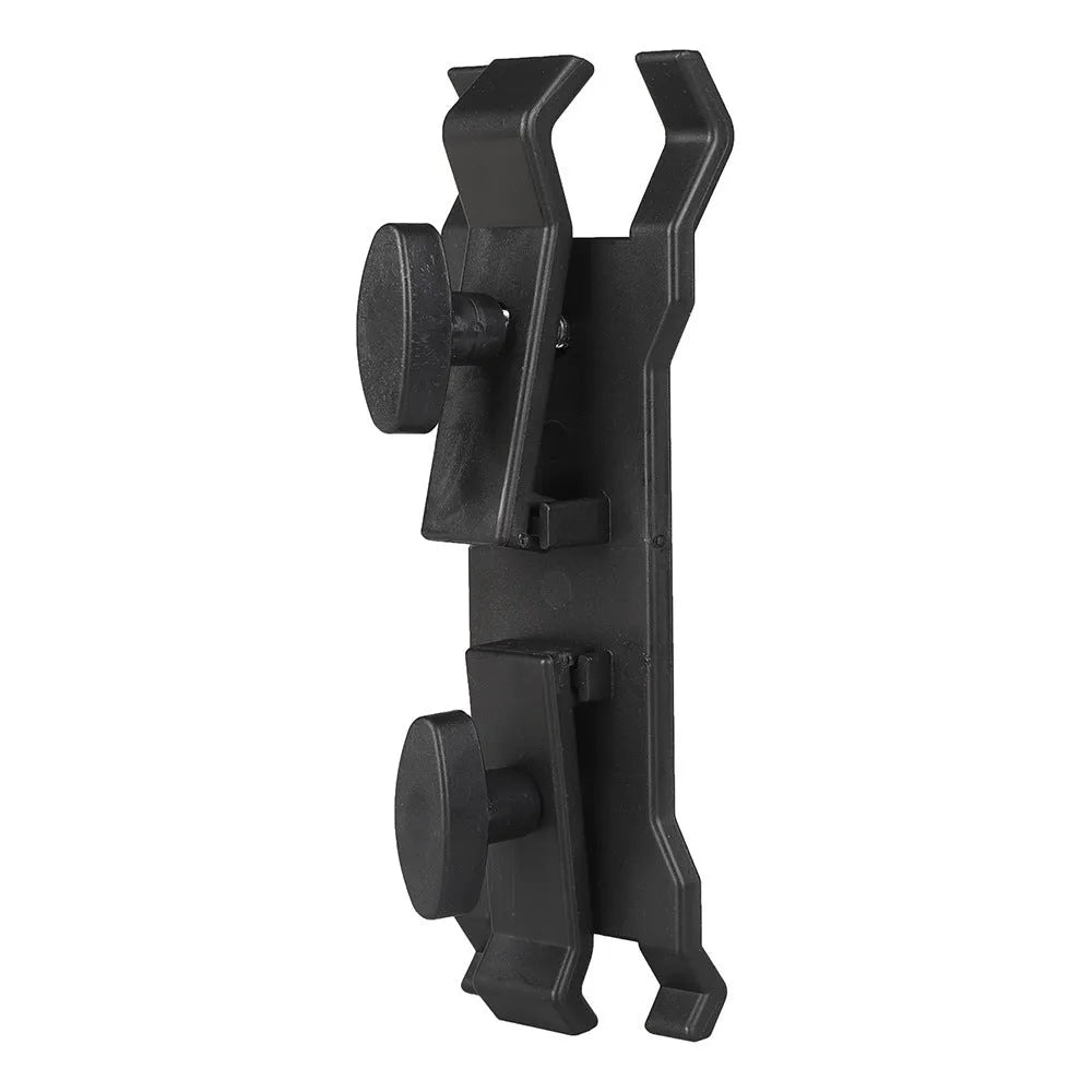 Black ABS umbrella clip attached to camera tripod shaft with umbrella in mounting position