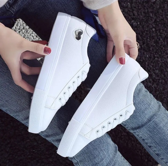Women's PU leather heart flats shoes with colourful beads and stainless steel pendant on white background