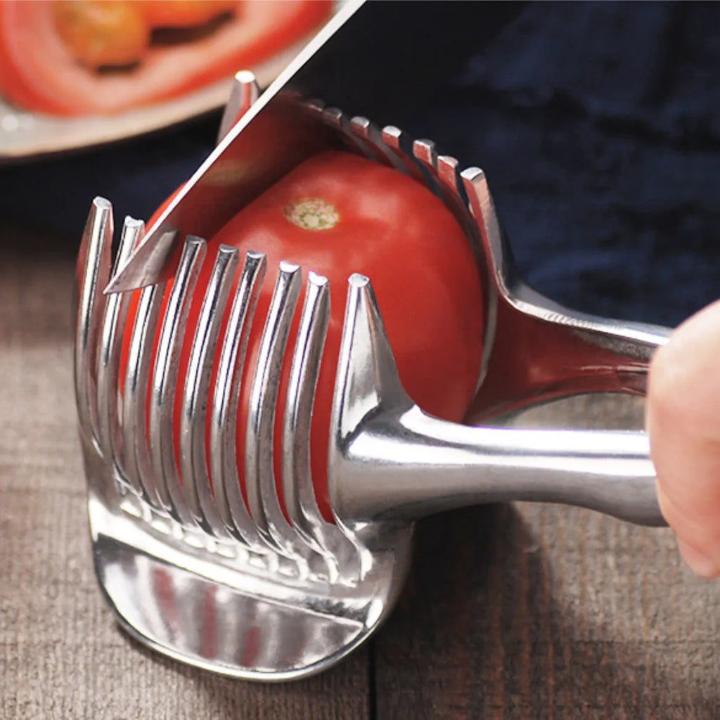 Silver-coloured plastic foldable lemon slicer kitchen gadget for cutting fruits and cakes