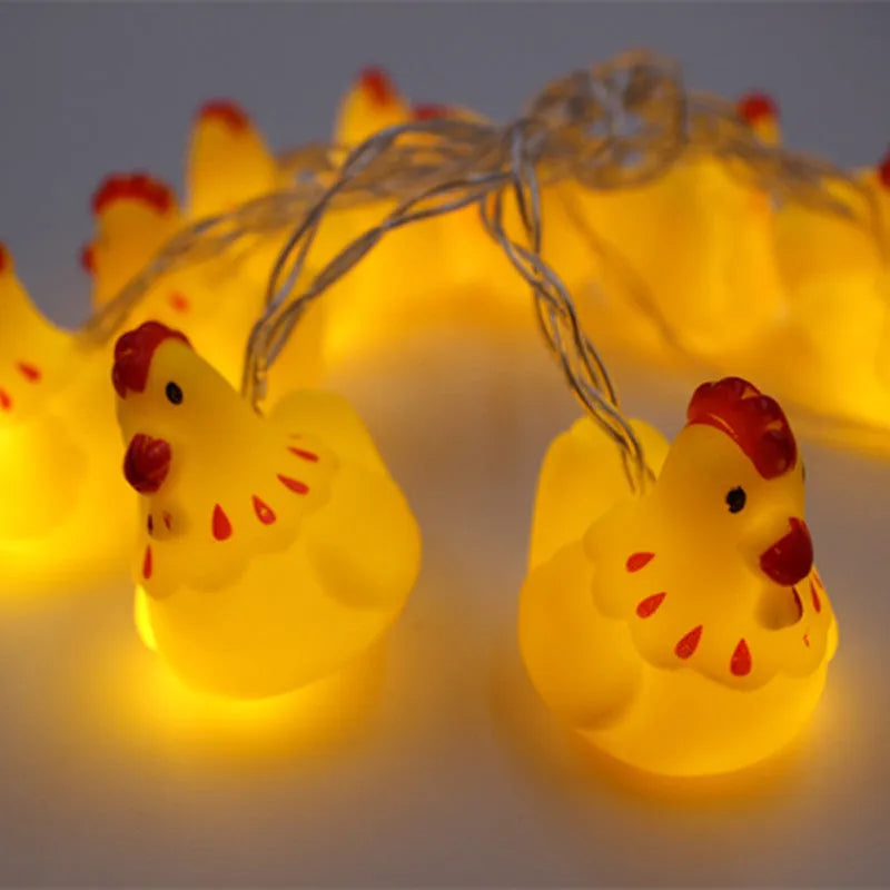 Vinyl animal LED light string 1.8m with 10 battery-operated animal pendant lights on a white background