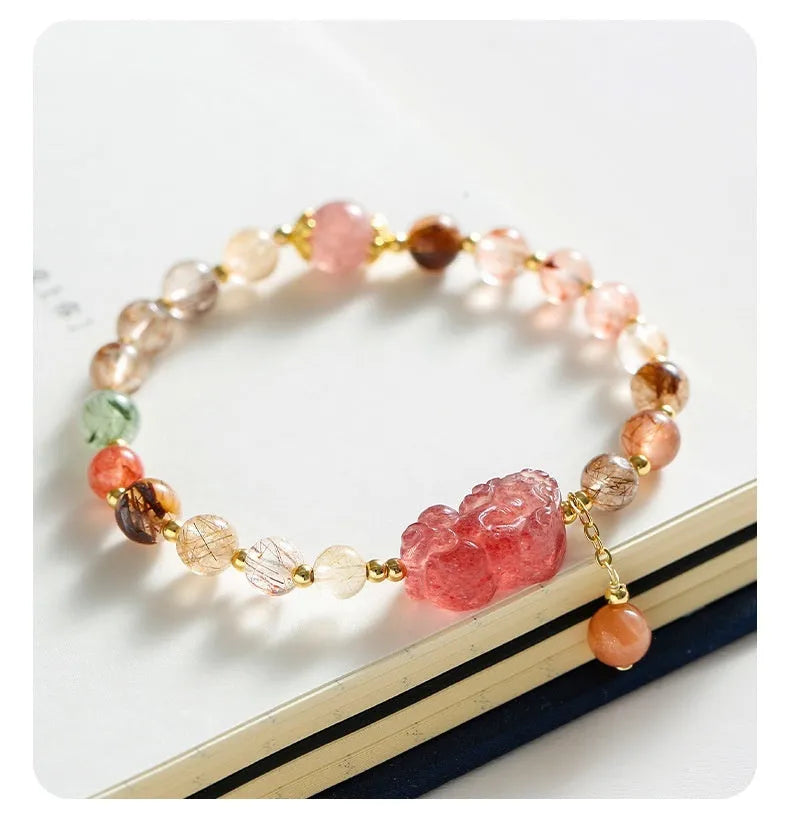 Strawberry quartz crystal bracelet with copper construction and pearl accents in dopamine crystal colour