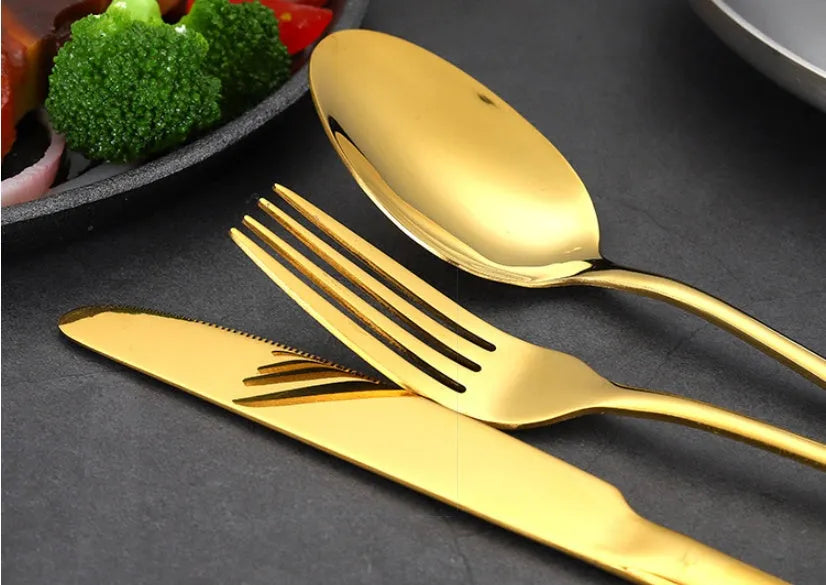 Stainless steel tableware 24 piece set showing table knives, forks, and spoons in multiple colour options