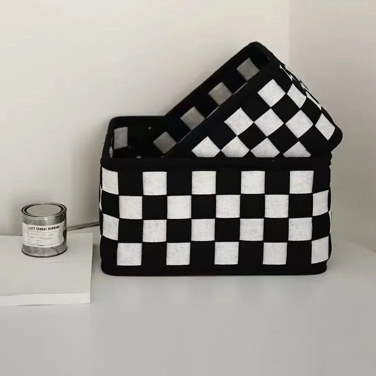 Checkerboard pattern woven felt storage basket folded and unfolded showing dimensions