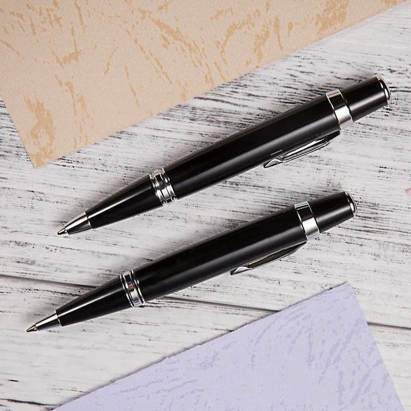 Short black metal ballpoint pen with rotating mechanism showing 112mm length