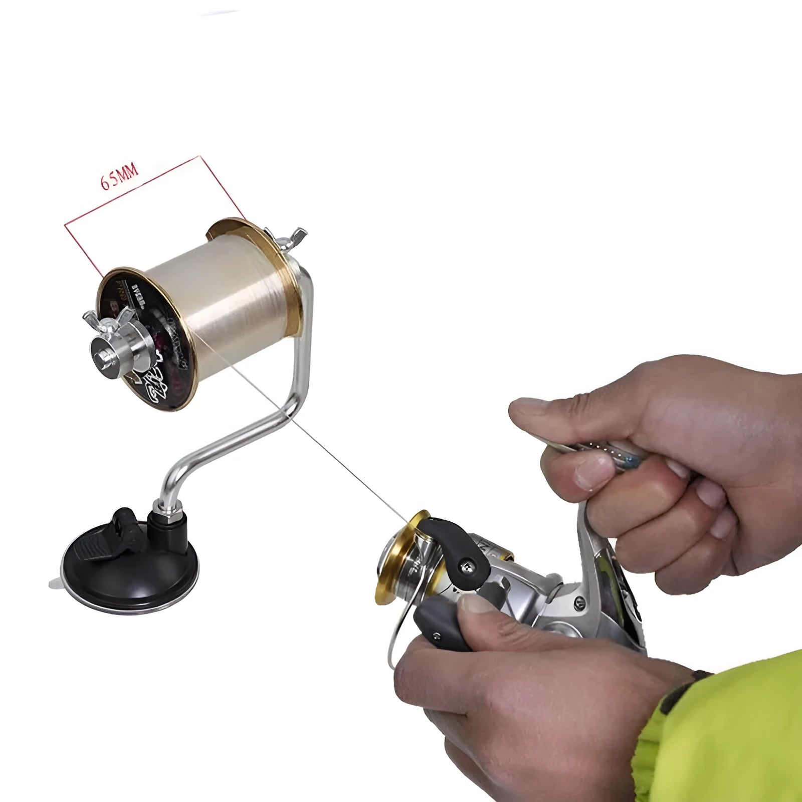Silver aluminium fishing reel winder with adjustable tensioner and suction cup base on smooth surface