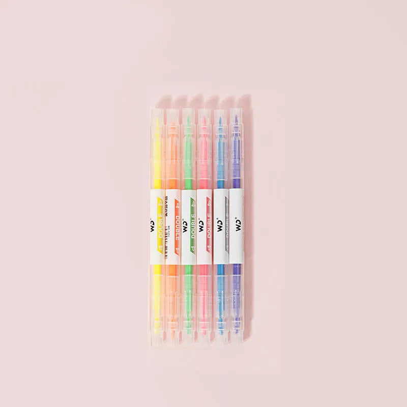 Set of six double-headed marker pens showing round and oblique tips, in assorted colours.
