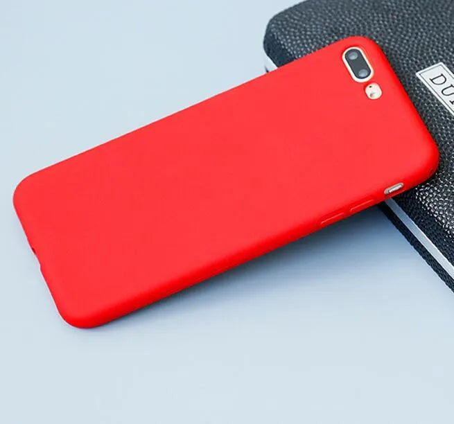 Frosted matte soft shell phone case for iPhone, shown in multiple colour options including blue, pink and black.
