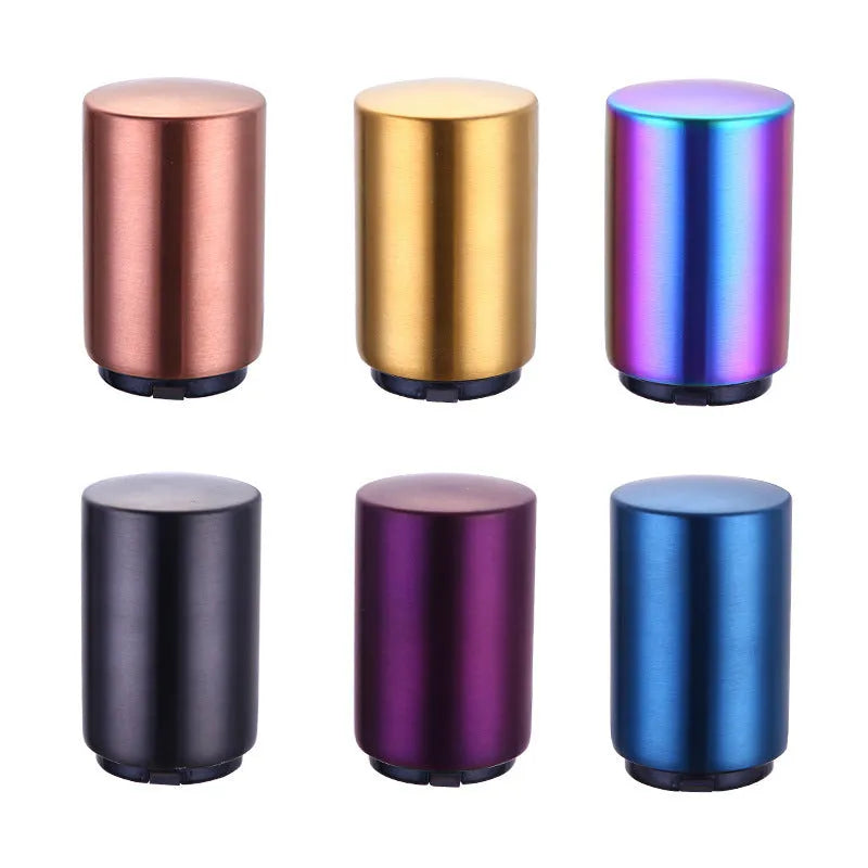 Portable magnetic stainless steel bottle opener with brushed metal finish on countertop