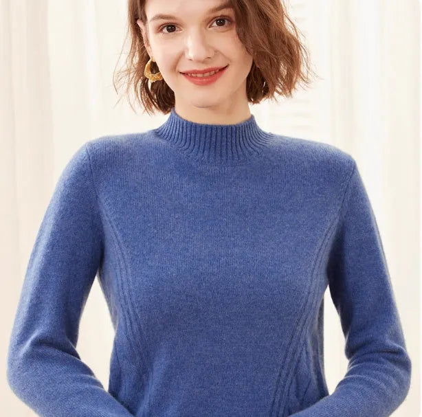 Women's pure cashmere turtleneck sweater in warm beige on model, high-neck pullover design