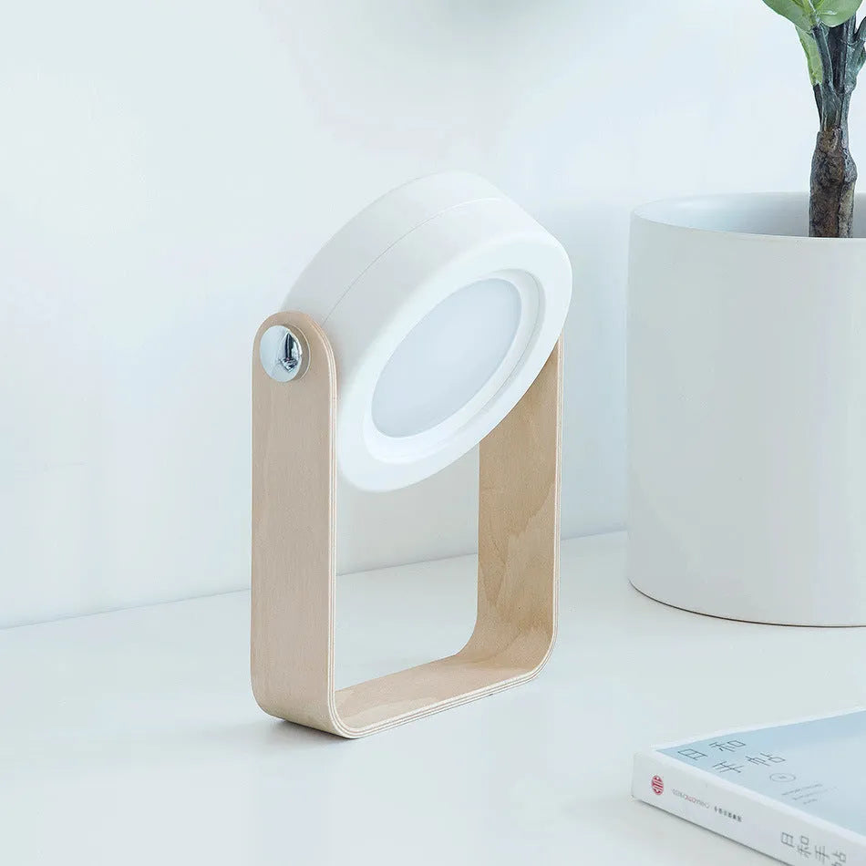White foldable USB rechargeable LED lantern lamp shown in both table and upright night light modes.