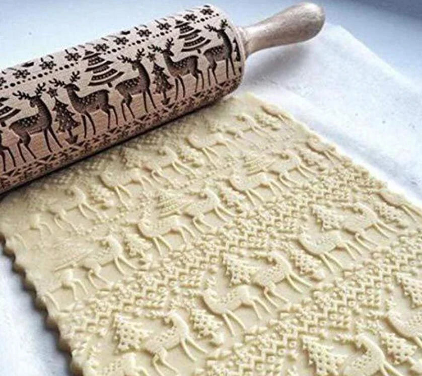 Personalized Christmas rolling pin with a variety of embossed holiday designs, including snowflakes, reindeer, and Merry Christmas patterns