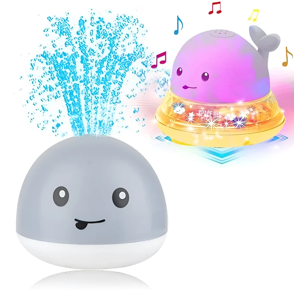 Automatic water spray whale bath toy with lights on a blue base.