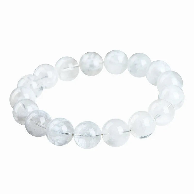 Crystal women's bracelet with natural blizzard snowflake round beads in geometric shapes showing traditional Ruyi and Xiangyun motifs