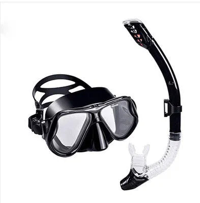 Anti-fog diving goggles with a polycarbonate frame and blue silicone mask on an adjustable strap.