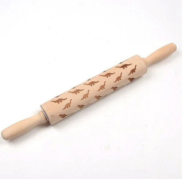 Personalized Christmas rolling pin with a variety of embossed holiday designs, including snowflakes, reindeer, and Merry Christmas patterns