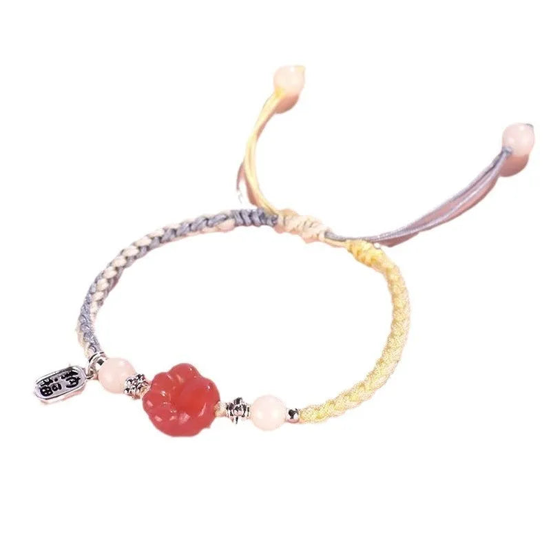 Red cat's paw woven couple bracelet with glass and coloured glaze in pastoral style